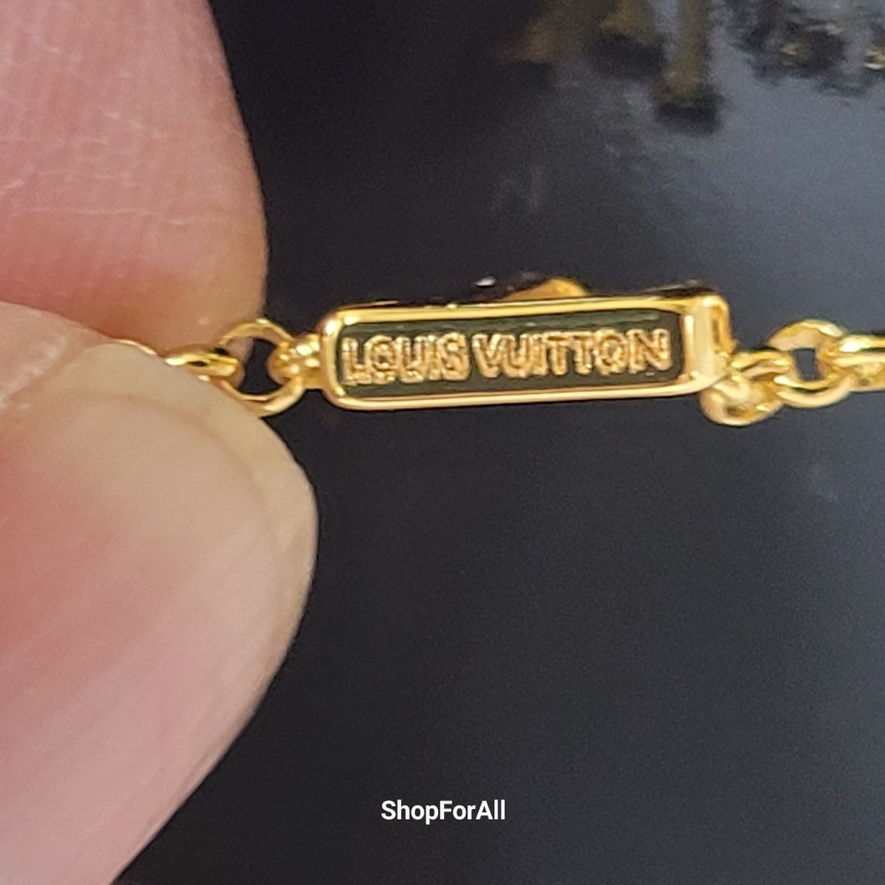 Louis Vuitton Gold Tone Charm Bracelet - Picture 14 of 17